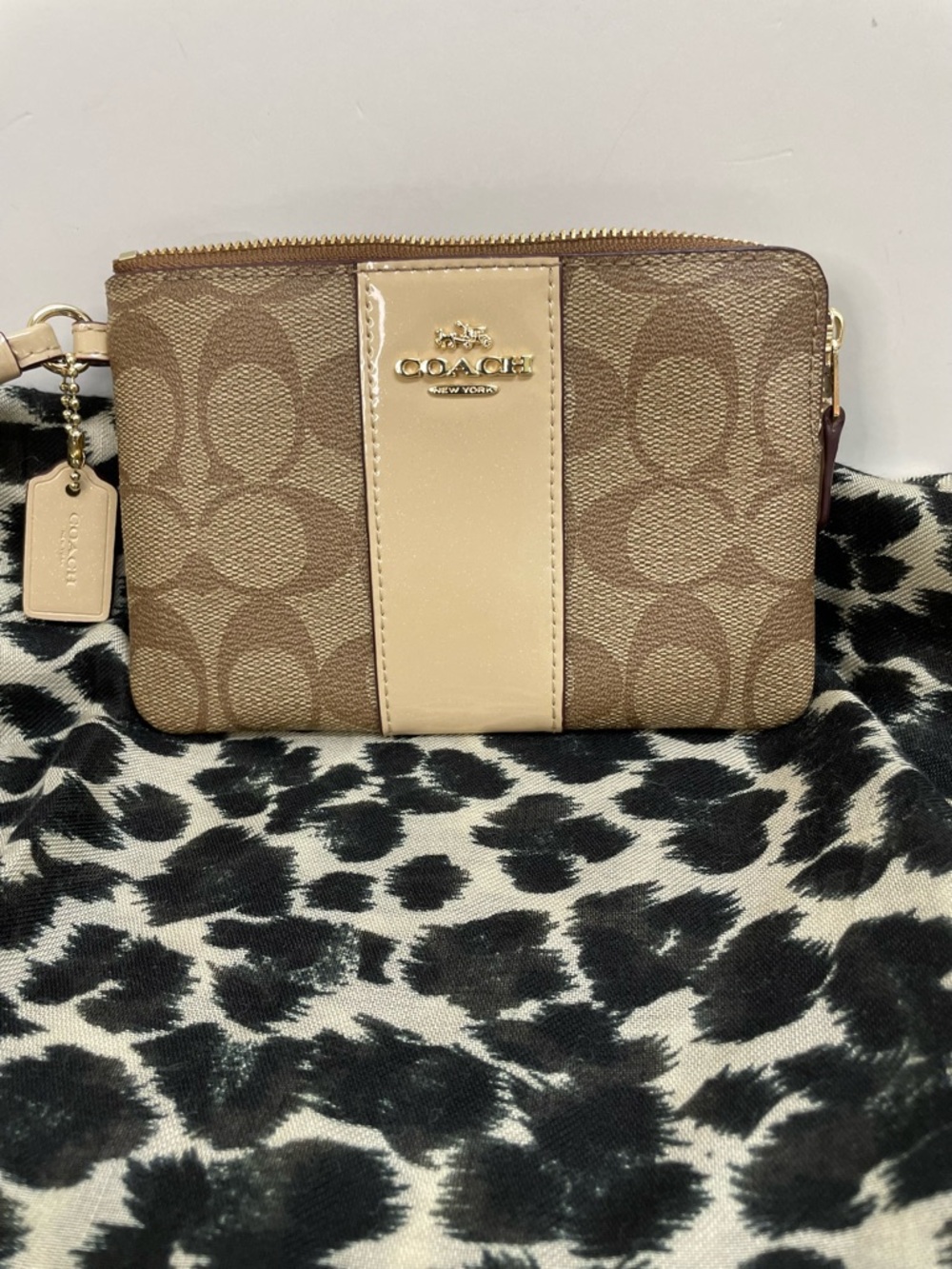 Coach Signature Zip Wristlet in Brown and Cream